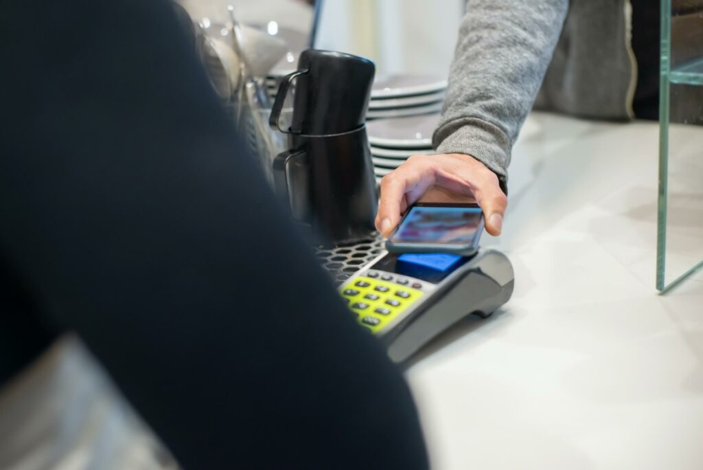 A person paying with a smartphone