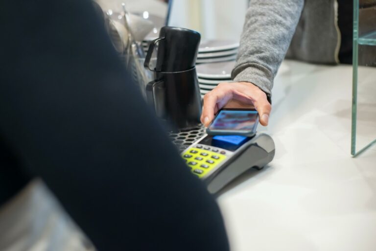 A person paying with a smartphone